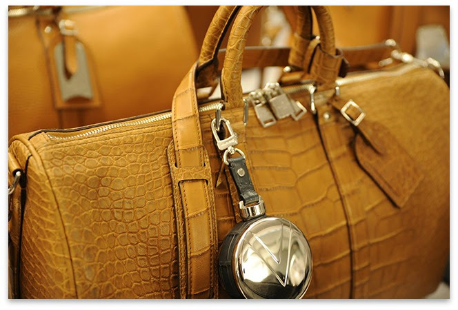 What does a designer handbag have to do with wealth?