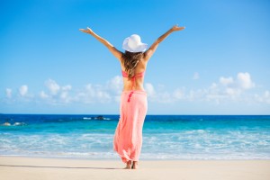 Happy woman at the beach